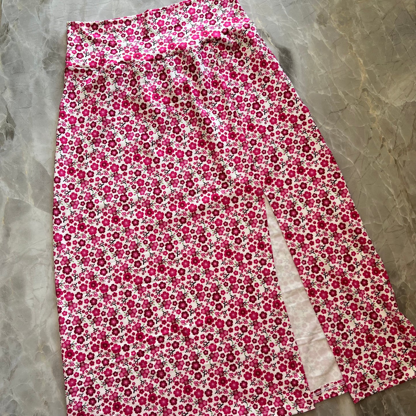 FALDA FLORES FUCSIA